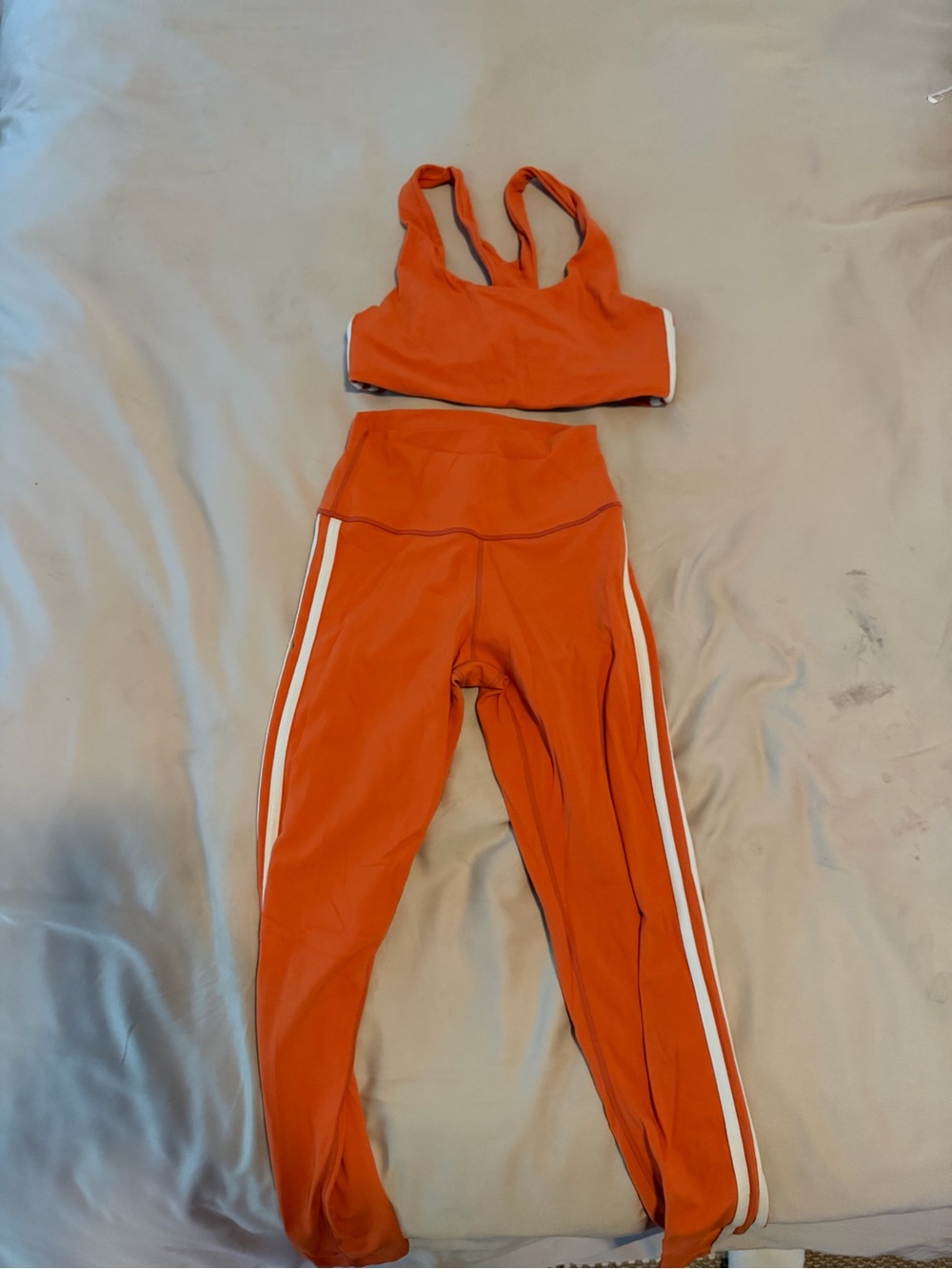 Splits59 Orange Leggings with White Side Stripes